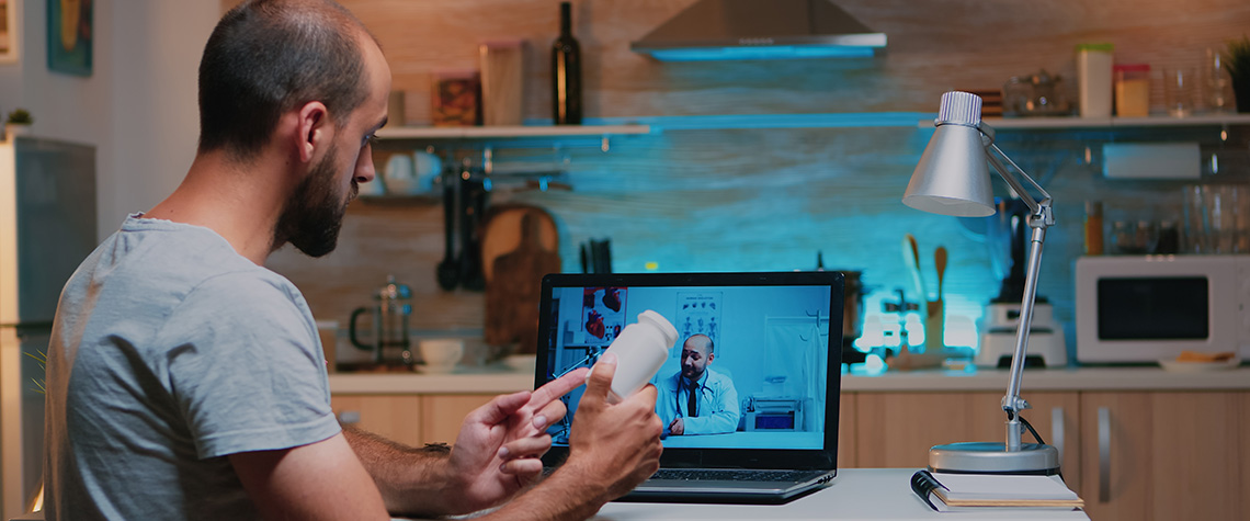 Doctor videoconferencing remote patient consulting  about how to microdose psilocybin magic mushrooms.