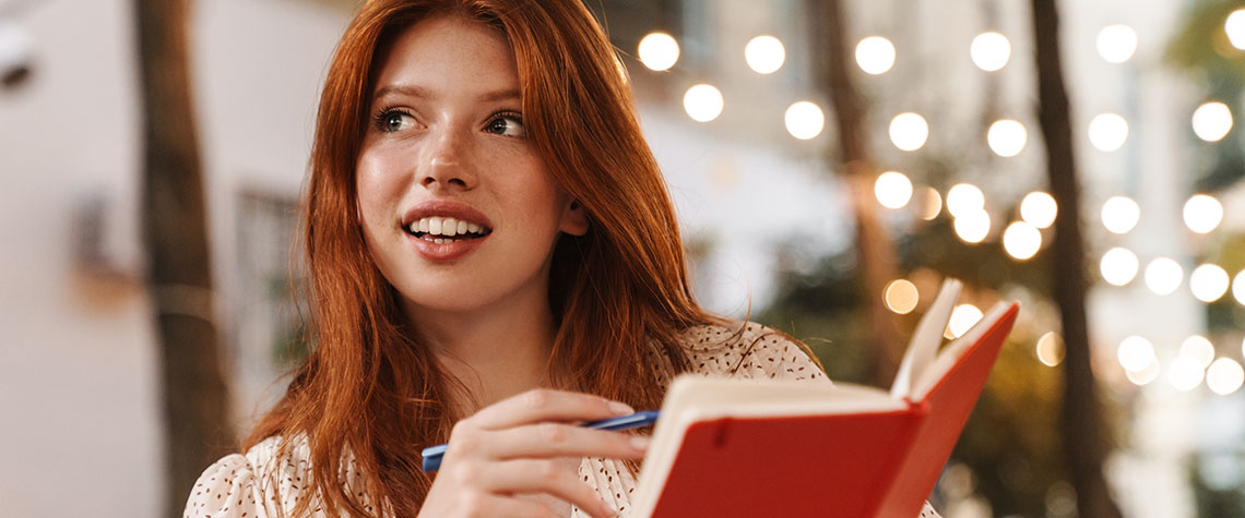 Image of joyful red head girl smiling. How long does it take for mushrooms to take effect?