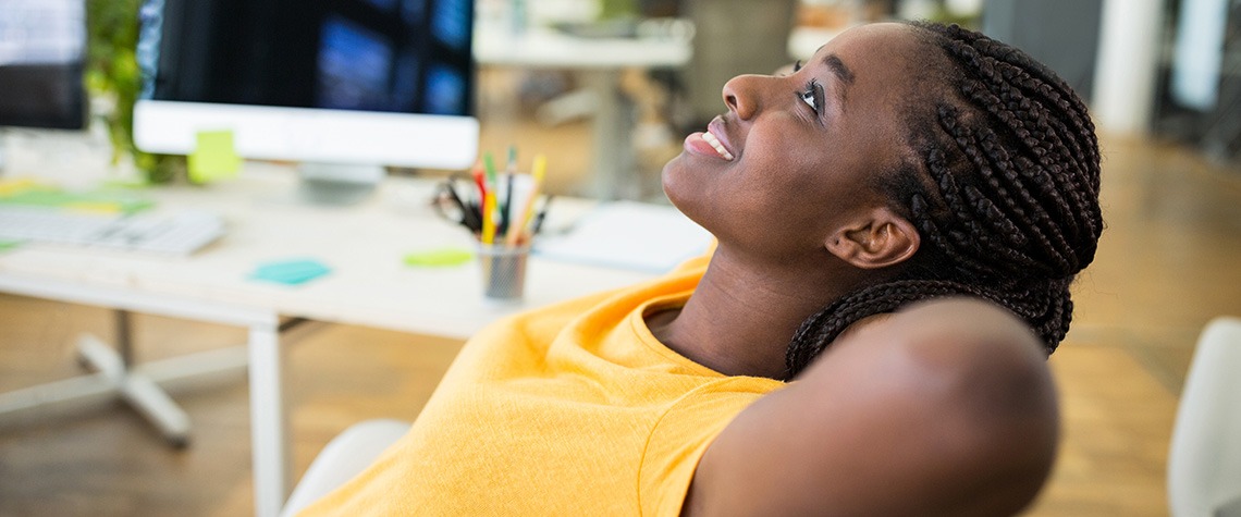 Female relaxing on a chair in office. penis envy mushroom strain buy online. penis envy mushrooms strength.