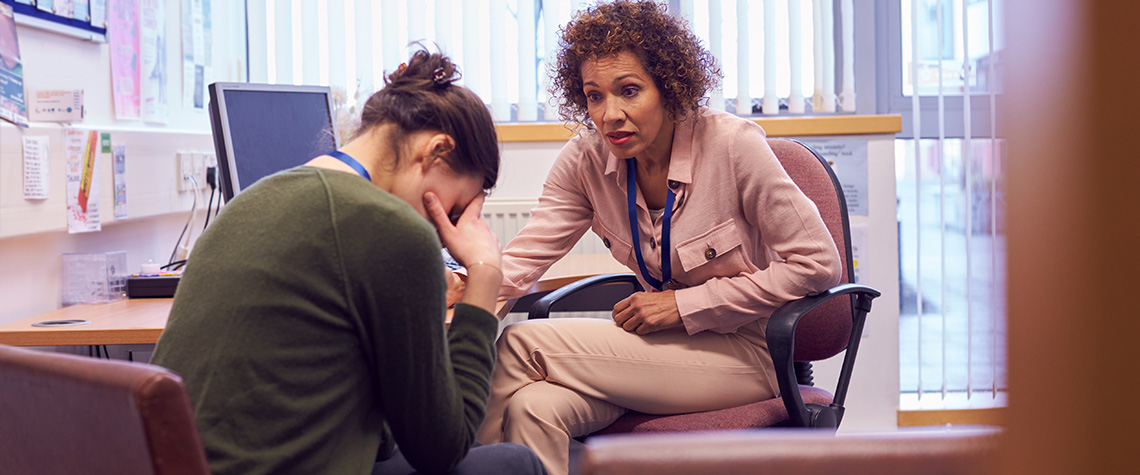 Female Meeting With Counselor Discussing Mental Health Issues. Do magic mushrooms have health benefits?